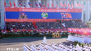 Kỷ niệm trọng thể 50 năm Quốc khánh nước Cộng hòa Dân chủ Nhân dân Lào